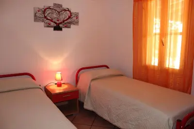 Letto o letti in una camera di VillaRosa