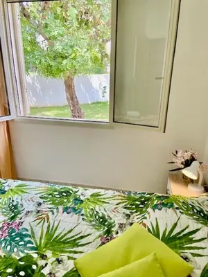 Letto o letti in una camera di Villa SERF a 100 m dalla spiaggia