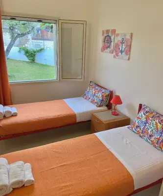 Letto o letti in una camera di Villa SERF a 100 m dalla spiaggia