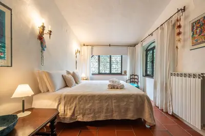 Letto o letti in una camera di Villa Mistral