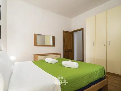 Letto o letti in una camera di Casa Mazzini - Morada
