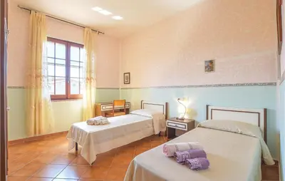 Letto o letti in una camera di Nice Apartment In Villaurbana With Wifi