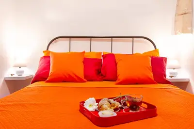 Letto o letti in una camera di Apart Suites Marina