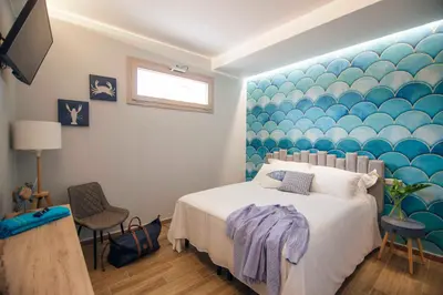 Letto o letti in una camera di Villa Teresina