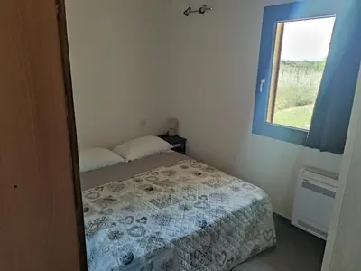 Letto o letti in una camera di Roby's house, vivi la vacanza in relax (2L)