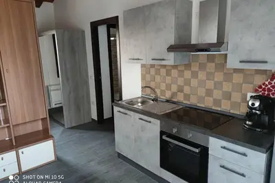 Cucina o angolo cottura di Roby's house, vivi la vacanza in relax (2L)