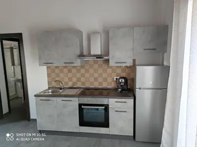 Cucina o angolo cottura di Roby's house, vivi la vacanza in relax (2L)