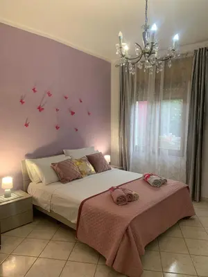 Letto o letti in una camera di Butterfly House