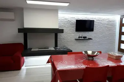 TV o dispositivi per l'intrattenimento presso Incantos Charme B&B & Apartment