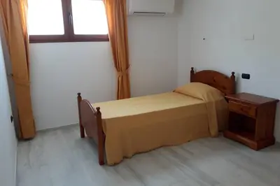 Letto o letti in una camera di Incantos Charme B&B & Apartment