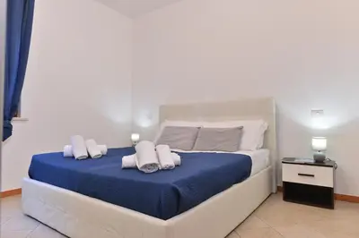 Letto o letti in una camera di IzzHome Blue Sea