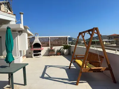 Balcone o terrazza di Attico via della Pineta 5 minuti dal mare