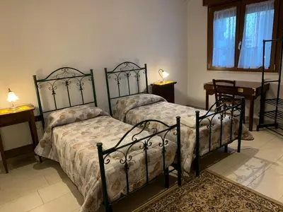 Letto o letti in una camera di Attico via della Pineta 5 minuti dal mare
