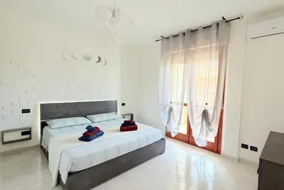 Letto o letti in una camera di Da Elisa
