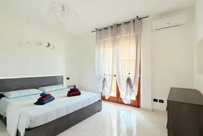 Letto o letti in una camera di Da Elisa