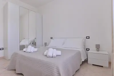 Letto o letti in una camera di IzzHome Lagoon