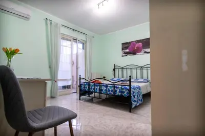 Letto o letti in una camera di Casa Marcy