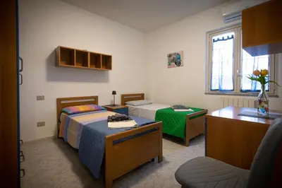 Letto o letti in una camera di Casa Marcy