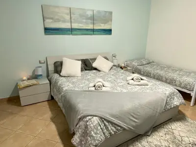 Letto o letti in una camera di Villa Bianca