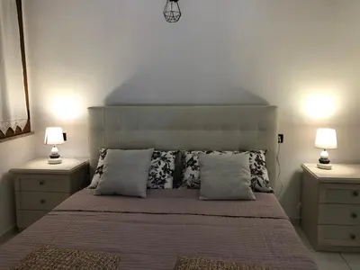 Letto o letti in una camera di Elegante monolocale al centro del paese