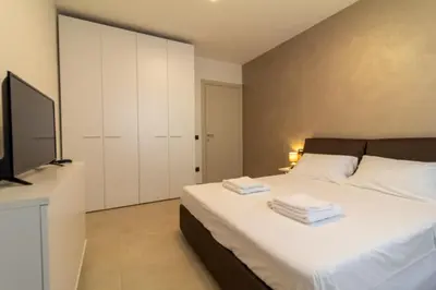 Letto o letti in una camera di Istai Poetto Apartment