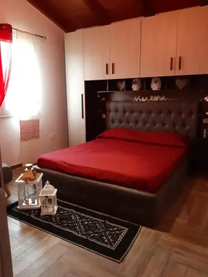 Letto o letti in una camera di Villa Erilia