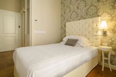 Letto o letti in una camera di Boutique Hotel Carlo Felice