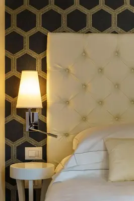 Letto o letti in una camera di Boutique Hotel Carlo Felice