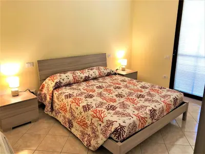 Letto o letti in una camera di La casetta del centro