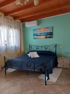 Letto o letti in una camera di Casa Valeria