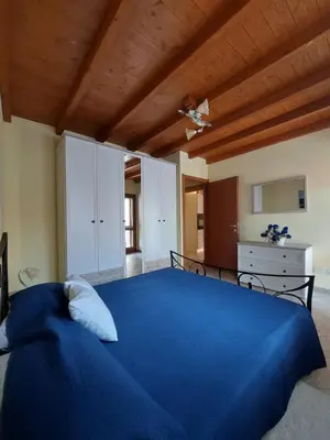 Letto o letti in una camera di Casa Valeria