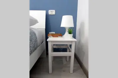 Letto o letti in una camera di Casa Almà Cagliari