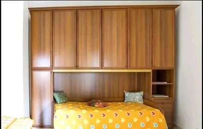 Letto o letti in una camera di CASA VACANZA BariSardo