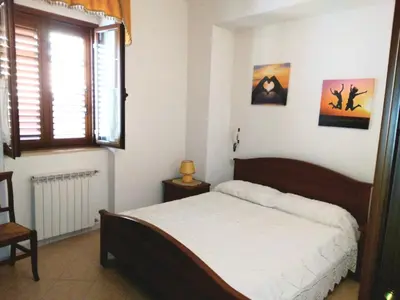Letto o letti in una camera di CASA VACANZA BariSardo