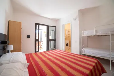 Letto o letti in una camera di Monolocale Free Beach Residence due passi dal mare