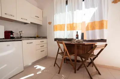 Cucina o angolo cottura di Monolocale Free Beach Residence due passi dal mare