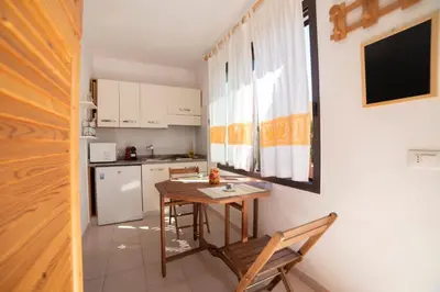 Cucina o angolo cottura di Monolocale Free Beach Residence due passi dal mare