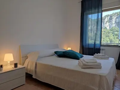 Letto o letti in una camera di Appartamento La Capretta Bianca - Affitti Brevi Italia