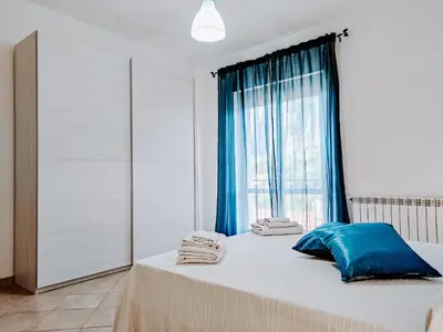Letto o letti in una camera di Appartamento La Capretta Bianca - Affitti Brevi Italia