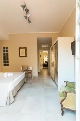Letto o letti in una camera di NEW HOME - appartamento in centro storico