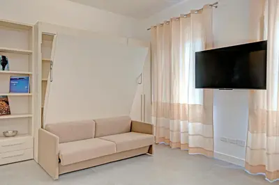 TV o dispositivi per l'intrattenimento presso Right House Sur le Port - Harbour View