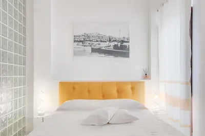 Letto o letti in una camera di Right House Sur le Port - Harbour View