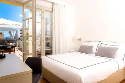 Letto o letti in una camera di Leopoldo Rooms