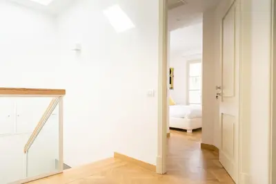 Letto o letti in una camera di Leopoldo Rooms