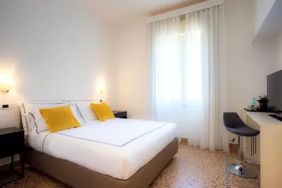 Letto o letti in una camera di Leopoldo Rooms