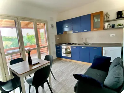 Cucina o angolo cottura di Torre dei Corsari APPARTAMENTO CON GIARDINO VISTA MARE