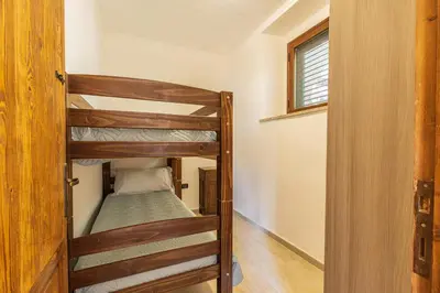Letto o letti in una camera di Casa Amelia sul Mare