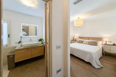 Letto o letti in una camera di Villa Bianca