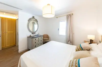 Letto o letti in una camera di Villa Bianca