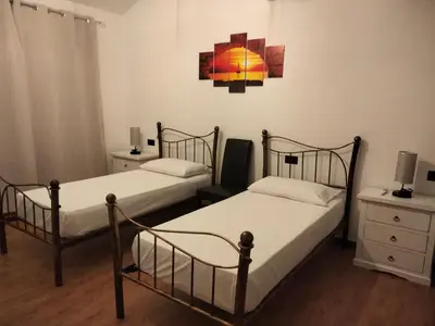 Letto o letti in una camera di Casa Janas Affittacamere Bed & Breakfast